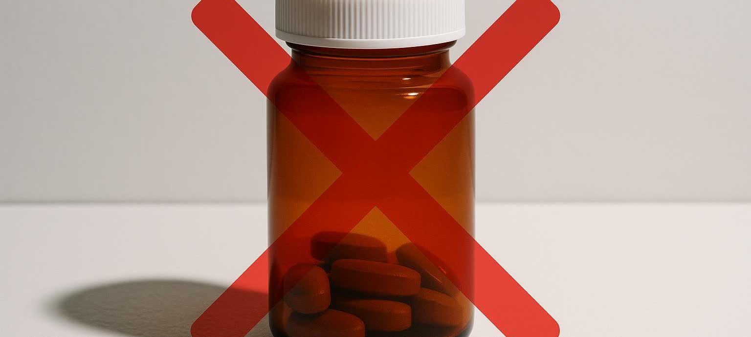An amber pill bottle containing brown pills, with a large red 'X' superimposed over it, clearly indicating a prohibition or warning against its contents, which are identified as MK-677 in the original alt-text.