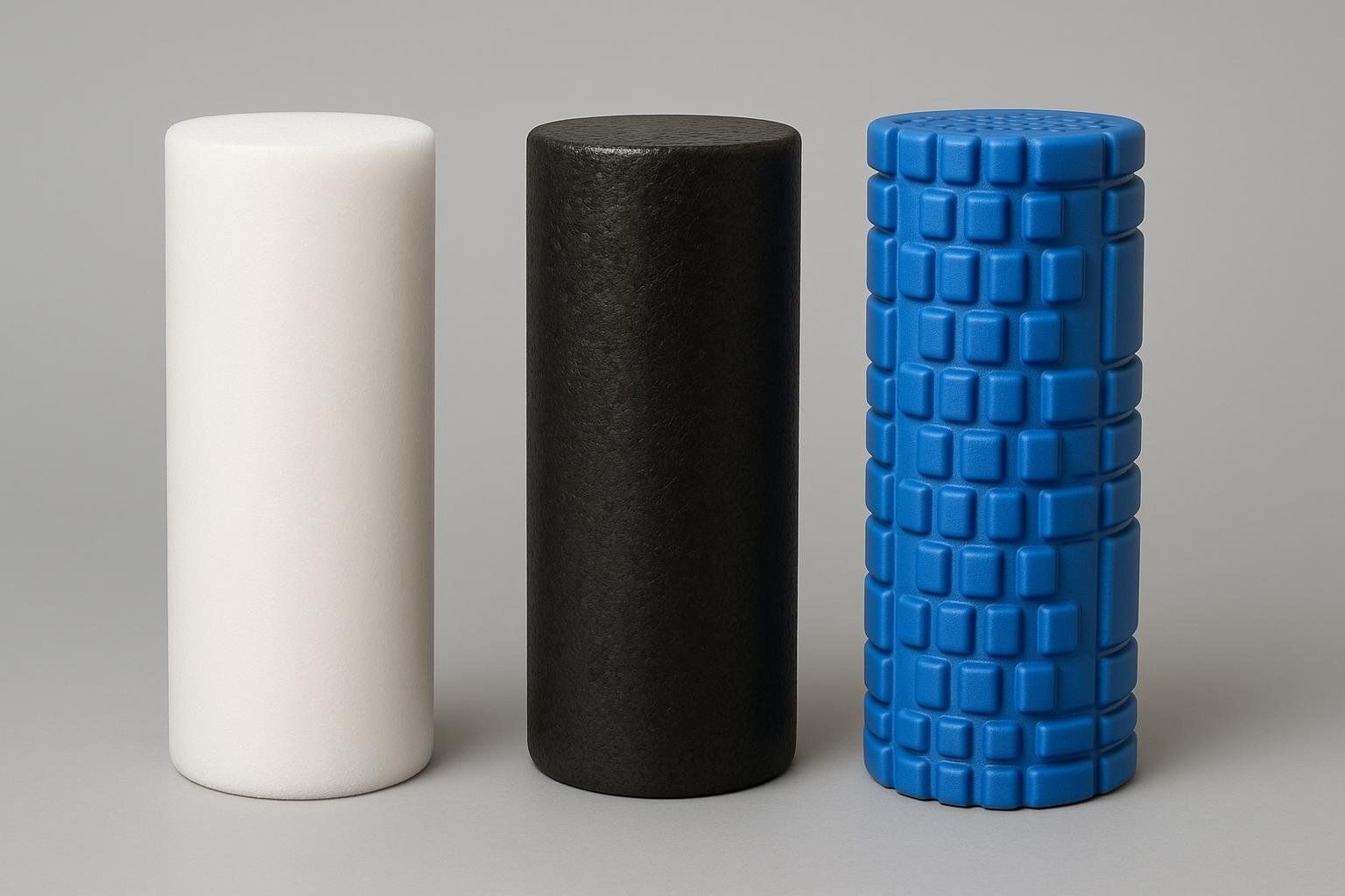A comparison photo of soft, medium, and high-density foam rollers.