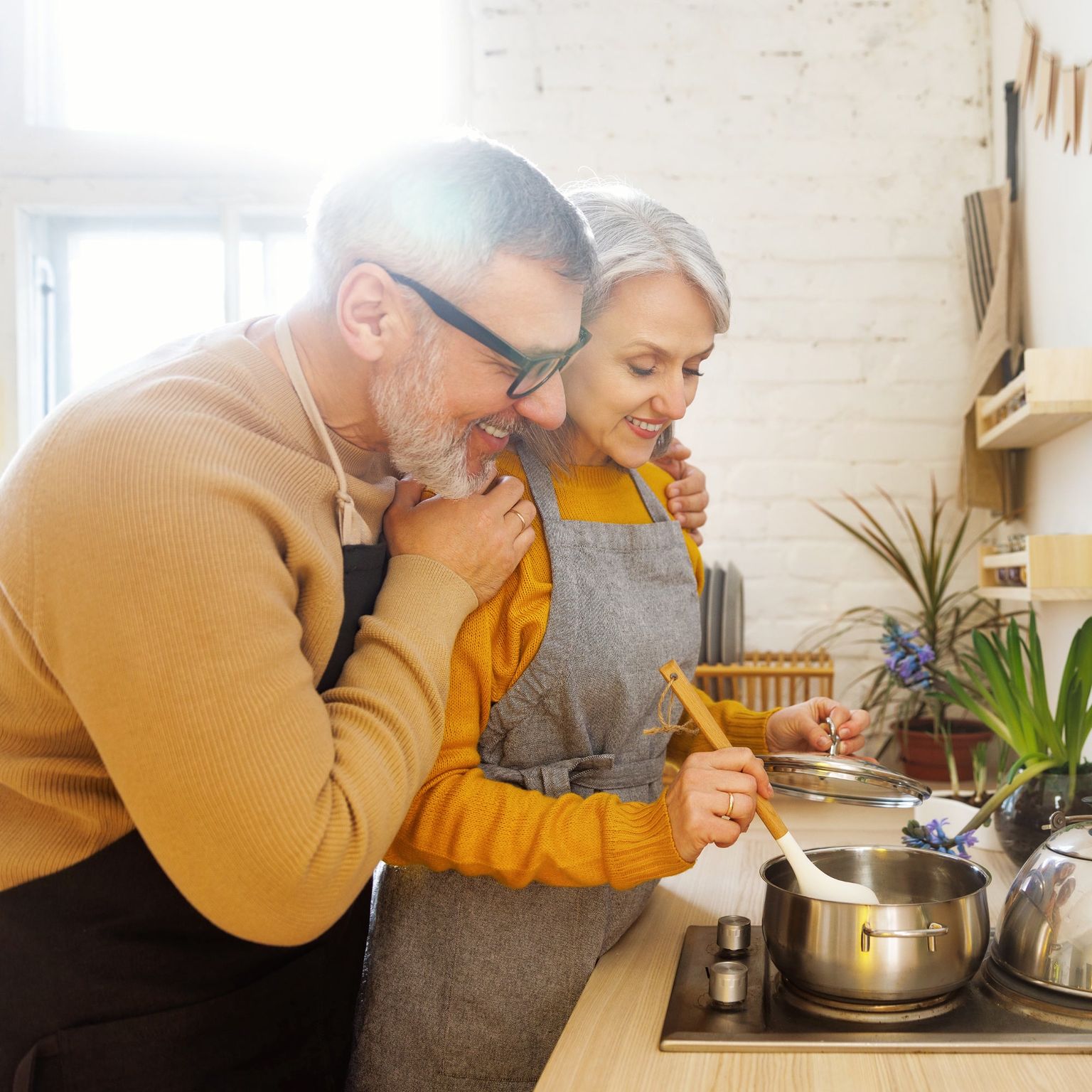 HalfImage: Older Couple Cooking